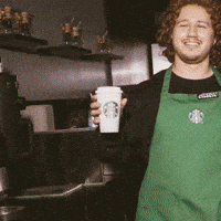 Sponsored gif. Flashing montage that rapidly shows different people holding Starbucks to-go cups. The cup is always at the center view and gradually gets closer and closer until the logo is the entire view.