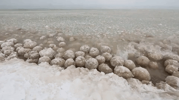 Giant Ice Boulders Floating Along Lake Michigan Shoreline