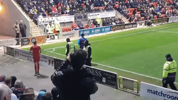 Match of the Day: Fan Mimics Opposing Player's Sideline Warmup