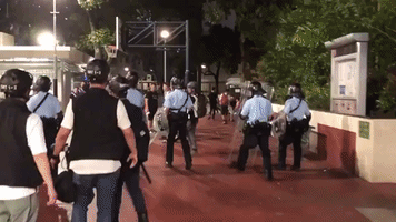 After Anti-Parallel Trading Demo Disperses, Hong Kong Police Clear Nearby Basketball Court