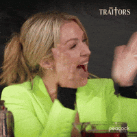 Sponsored gif. Traitors cast member Britney Haynes excitedly claps.