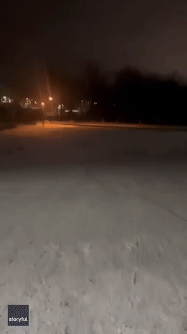 Watch Dad's Genius Hack to Pull Kids Uphill While Sledding