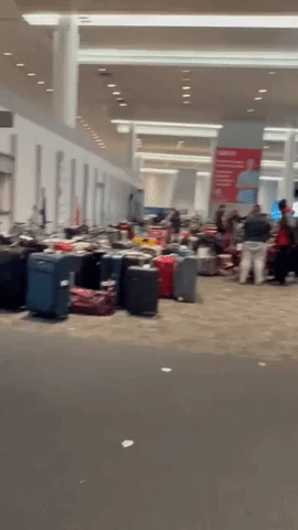 Luggage Piles Up at Toronto Airport as Storm Complicates Holiday Travel