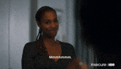 TV gif. Actress Issa Rae of Insecure emphatically nods her head with a straight smile. Text, "Mmmhmmm."