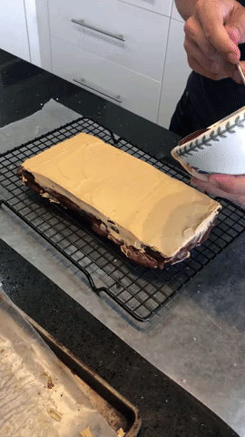 glazing an opera cake GIF