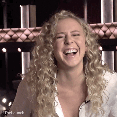 Reality TV gif. Maddie Storvold from The Launch laughing hard and doubling over on loop.