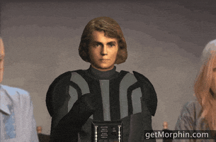 Digital art gif. Hayden Christensen as Darth Vader has his helmet off to show his expressionless face. He throws gold confetti in the air. 