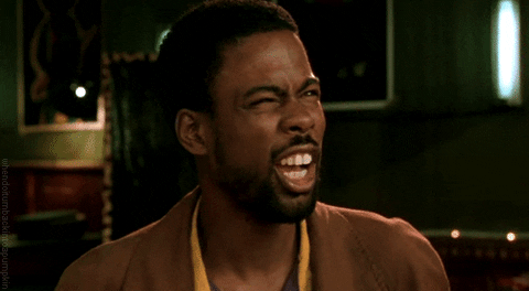 Celebrity gif. Chris Rock stares confused with his mouth open wide like he’s saying, “huh?” His eyes are squinting as if he needs a better look at what he’s seeing to understand it better. 