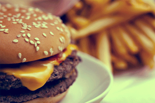 Ad gif. A bunch of different shots of McDonald's items, from Big Macs to fountain drinks to their quintessential fries.