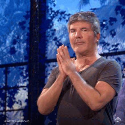 awkward simon cowell GIF by America's Got Talent