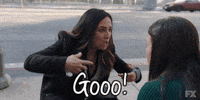 TV gif. Pamela Adlon as Sam in Better Things kneels in front of a woman and looks frantic as she says, "GO!" while pointing down the street and pushing the woman to rise and run.