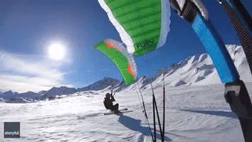 Kite Skiers Display Impressive Skills in French Alps