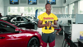 Hold Up Football GIF by Easterns Automotive Group