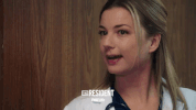 the resident smile GIF