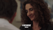 the resident smiling GIF