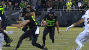Travis Running GIF by Pac-12 Network