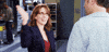TV gif. Tina Fey as Liz Lemon from 30 Rock sticks out her tongue and gives a high five to her coworker Pete Hornberger, played by Scott Adsit.