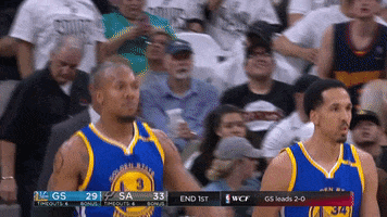 Sports gif. On the court, Golden State Warriors player David West gestures toward his eyes with two fingers as if to say, “I see you” before giving his teammate a high-five.
