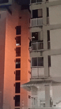 Girl Lowered Down From Building on Fire in Caracas