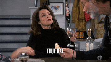 TV gif. Fran Drescher as Debbie on Indebted lifts a glass to cheers as she says, "True dat," then smiles contentedly.
