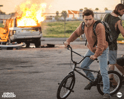 TNTDrama fire bike kid serious GIF