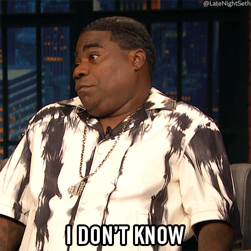 Celebrity gif. Tracy Morgan on Late Night with Seth Meyers tilts his head and shrugs his shoulders nonchalantly, mouthing the words, "I don't know."