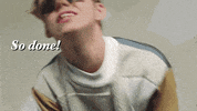 Music video gif. The Kid Laroi is wearing shuttershades and sings, "So done, so done, so done!" while he throws his arms and head back.