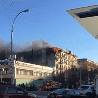 Fire Engulfs Top Floor of Manhattan Apartment Building