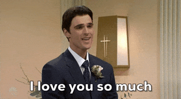 SNL gif. Jacob Elordi dressed as a groom standing in a church, pouts with his eyes saying, "I love you, so, much."