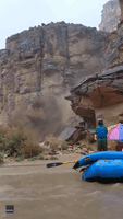 Water and Debris Floods Into Grand Canyon
