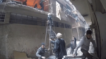White Helmets Use Makeshift Bridge to Rescue Injured Woman in Irbin