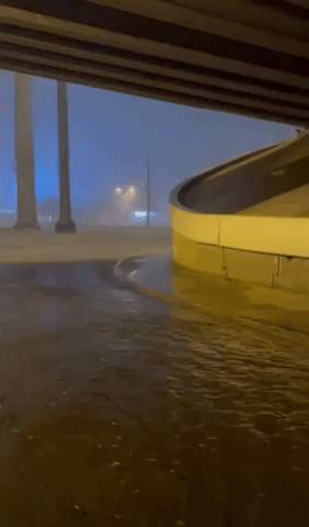 Water Gushes Under Bridge as Flash Flooding Hits