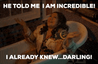 Music video gif. From the video for Kinni Kinni Vaari, Tanvi Geetha Ravishankar lies in a bathtub and spreads her robed arms out, looking up joyfully, while gold flakes appear to fall down all over her. Text, "He told me I am incredible! I already knew...darling!"