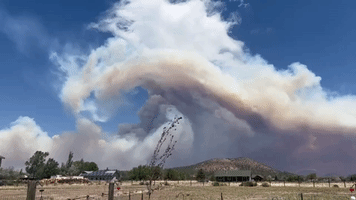 Smoke Swirls Above Arizona's Coconino County as Wildfires Grow Beyond 20,000 Acres