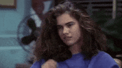 Movie gif. Heather Langenkamp as Nancy in A Nightmare on Elm Street rubs her eye and then her forehead as she rests her head on her hand.