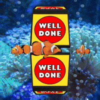 Digital art gif. We are underwater and clown fish swim around a cycling panel that says, "Well done."