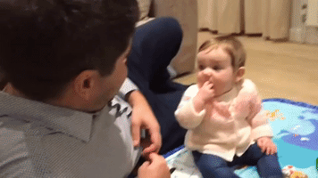 Adorable Baby Girl Laughs Uncontrollably After Dad's Jokes