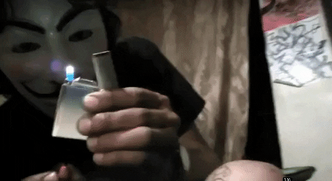 simbasims giphygifmaker fire fire fire fire guy fawks playing with fire GIF