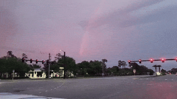Pink Rainbow Soars at Sunset After Stormy Day in North Central Florida