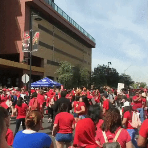 Arizona Teachers in Red March Through Downtown Phoenix