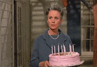 suspicious birthday cake GIF