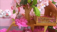 Hamsters Have Fun in Their Cute Tree-House