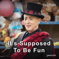 Sponsored gif. Alan Cumming as host of The Traitors in a top hat, black suit, and red sash stands in the rain while saying, “It’s supposed to be fun,” with a disgruntled look on his face. Text also reads, “It’s supposed to be fun.”
