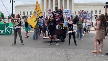 Protesters Gather Outside Supreme Court as Abortion Decision Anticipated