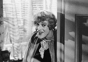 some like it hot pointing GIF