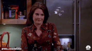 megan mullally eyebrow raise GIF by Will & Grace