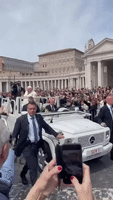 Pope Francis Waves to Crowd for Palm Sunday Mass