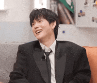 Charming Laughing GIF