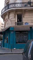 Clarinetist Serenades Parisian Neighborhood From Window