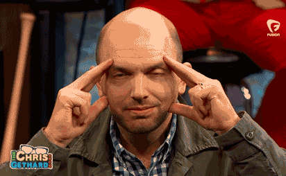 TV gif. Paul Sheer from The Chris Gethard Show gazes intensely at us with his fingers pressed against his temples as if he's transmitting a vision. He relaxes after getting his idea across.
